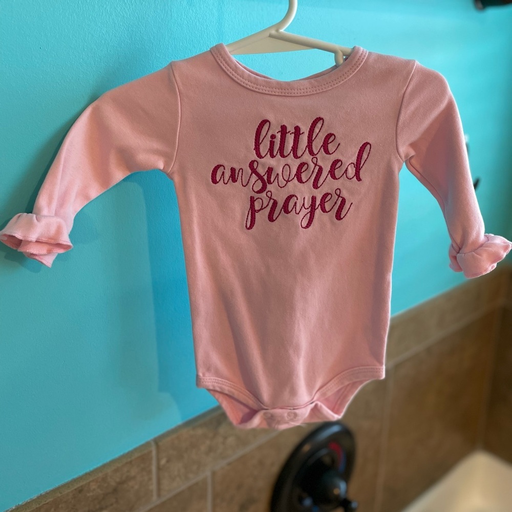 “Little Answered Prayer” pink long sleeved onesie